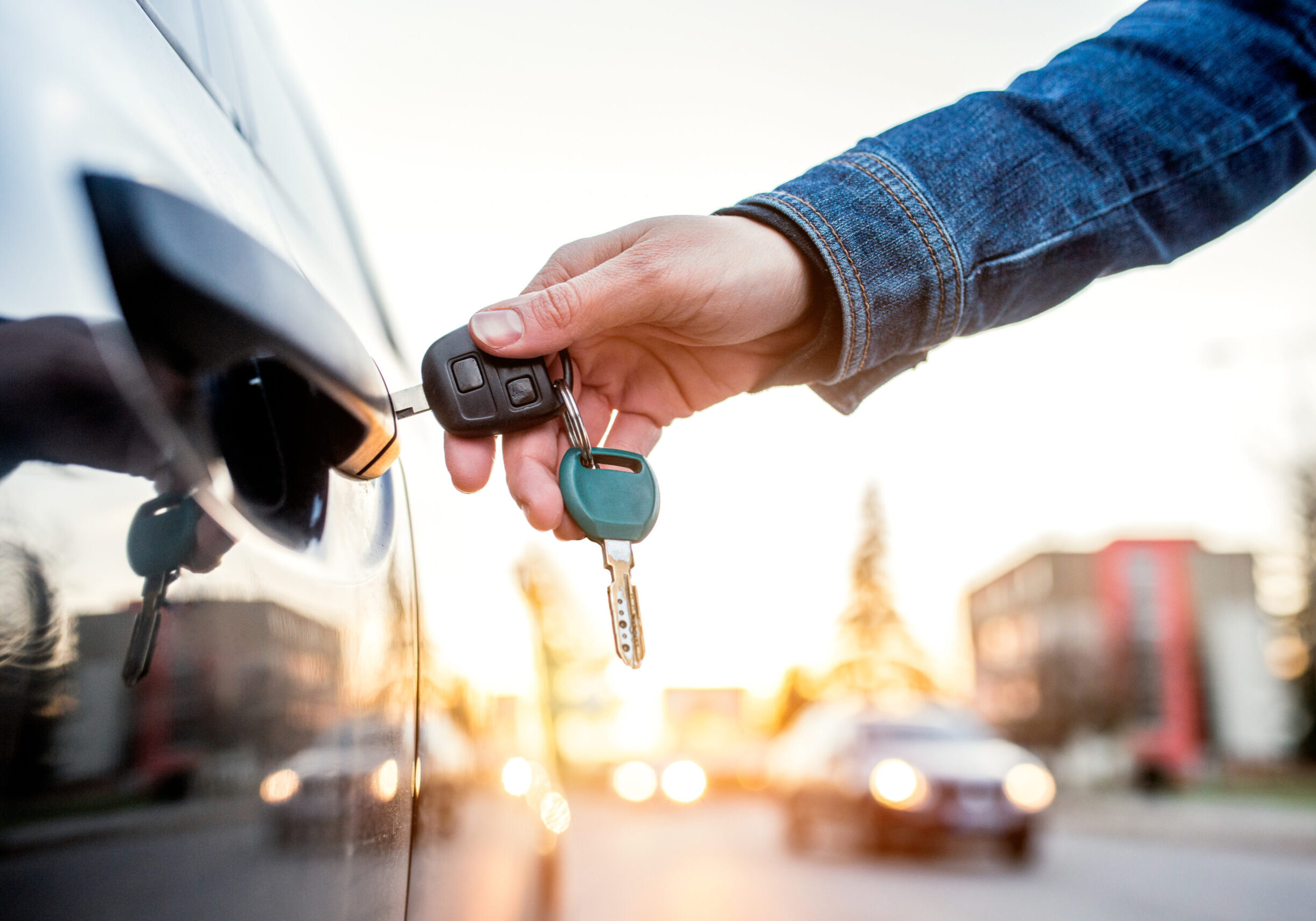 Woman with car key Key Cutting Rushden